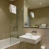 Bathroom with shower/tub combination (The Morton Hotel)